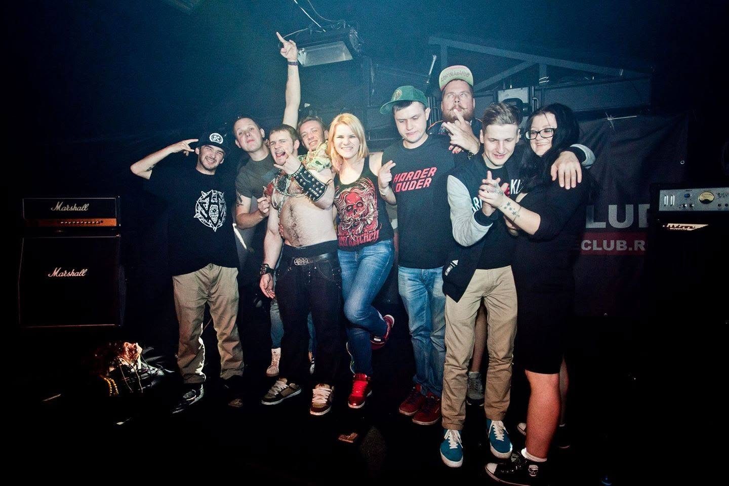 Artists, friends and crew together after a show