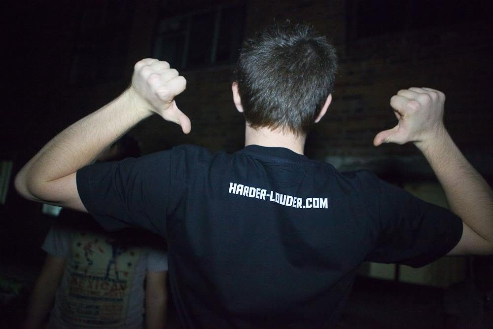 The back of a Harder & Louder label shirt